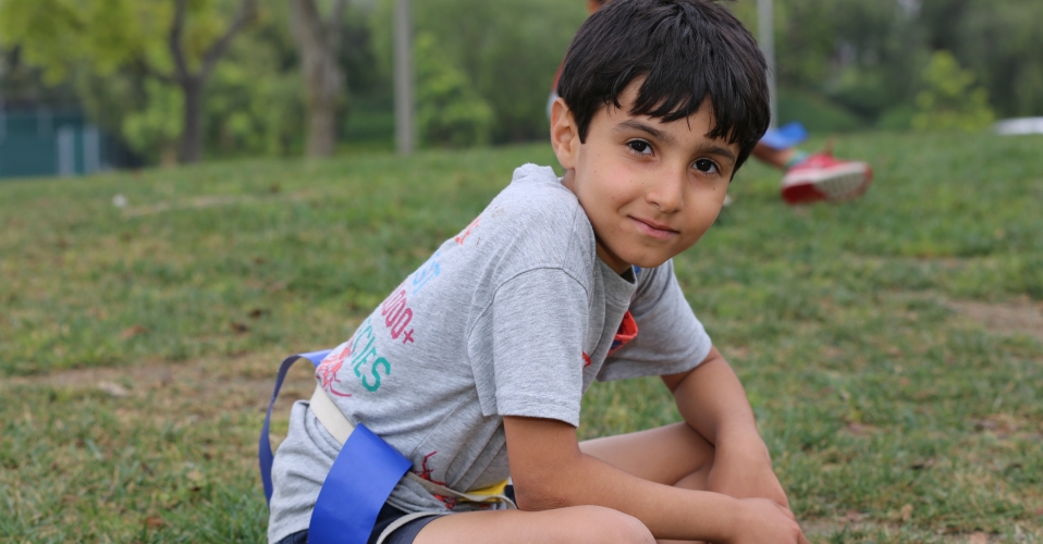 Boy playing flag football